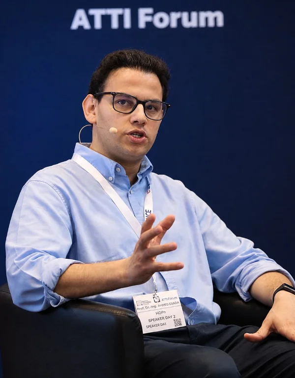 Ahmed Ebada speaking on a panel at the ATTI Forum